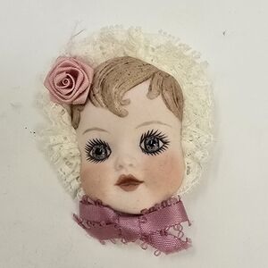 Vintage ceramic baby face brooch pin